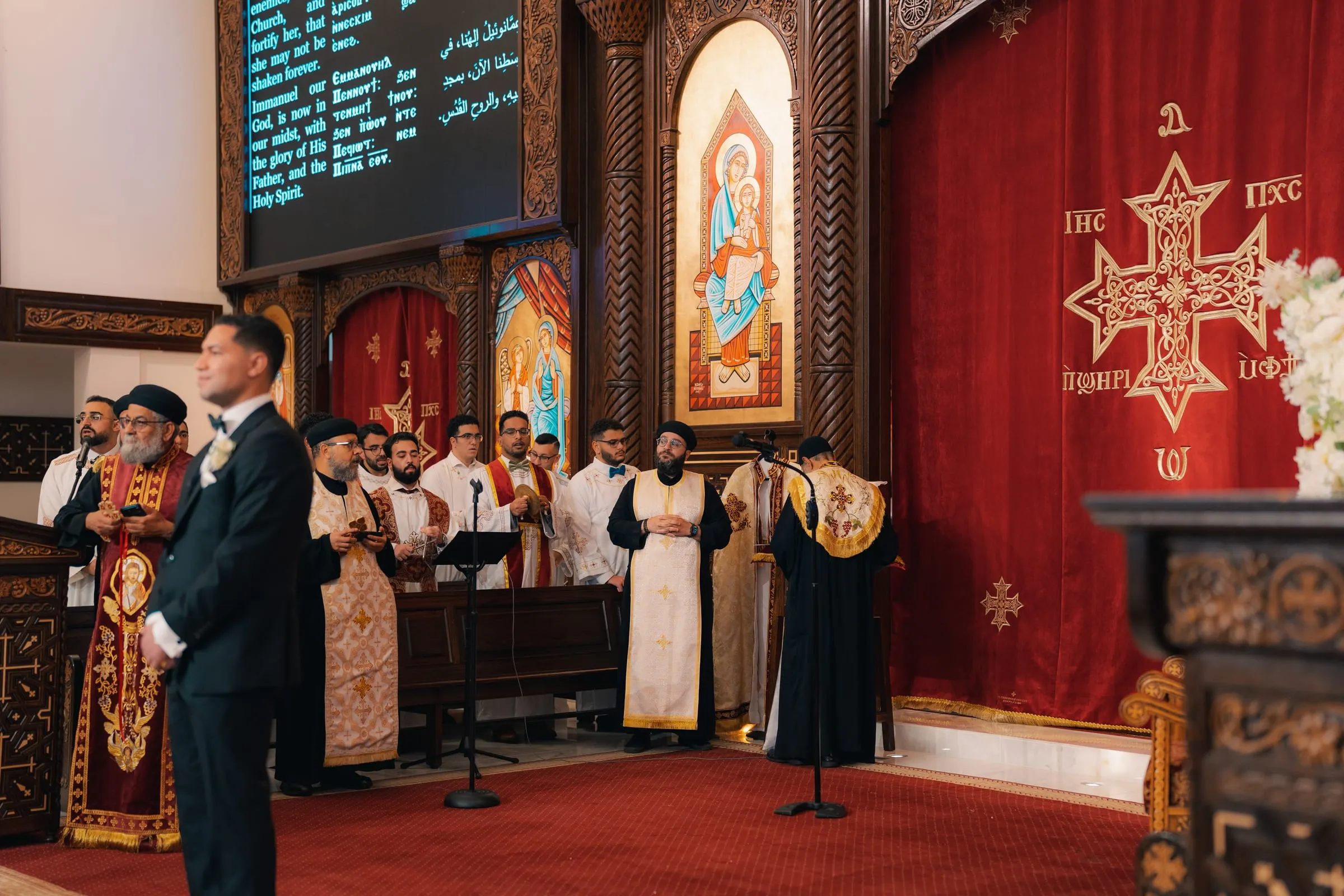 Mina standing before the altar during the Coptic wedding ceremony