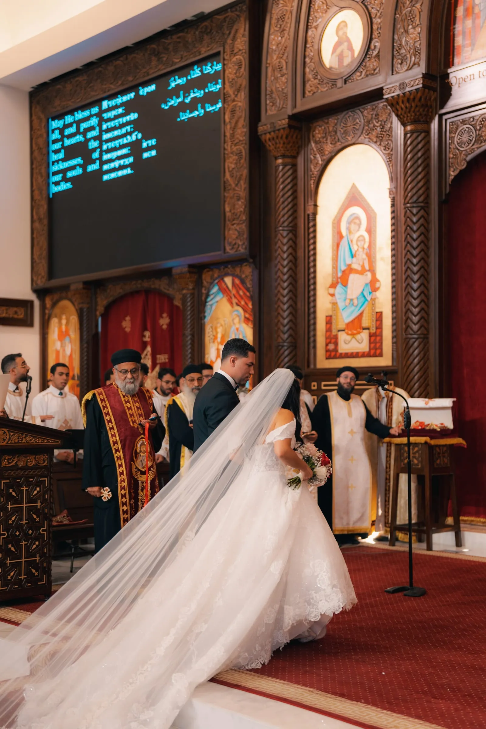 The bride and groom approaching the altar as the ceremony begins