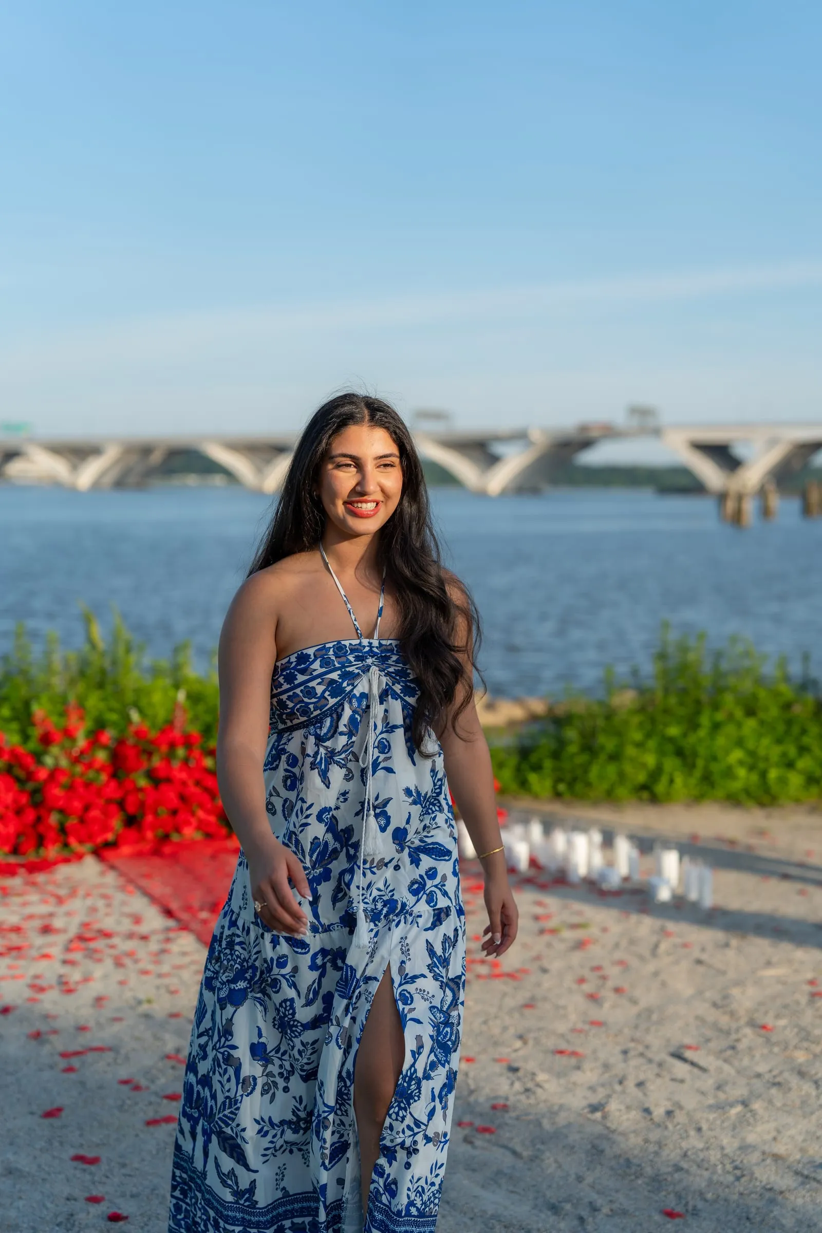 A final portrait of newly engaged Verina at the riverside proposal site in Old Town Alexandria